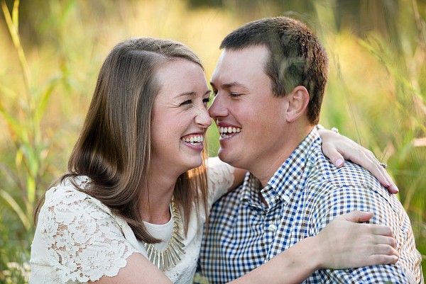 romantic_field_engagement_portrait_charleston_bride_groom.jpg