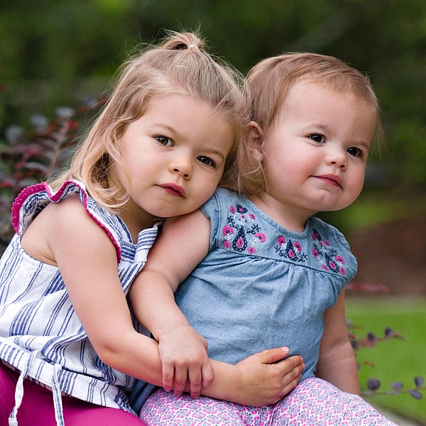 lifestyle-family-photographers-charlotte-sisters.jpg lifestyle charleston sc family photographers sisters portrait